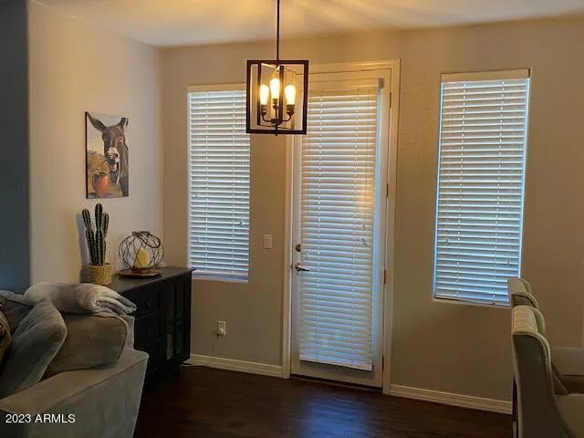 a view of a balcony with furniture