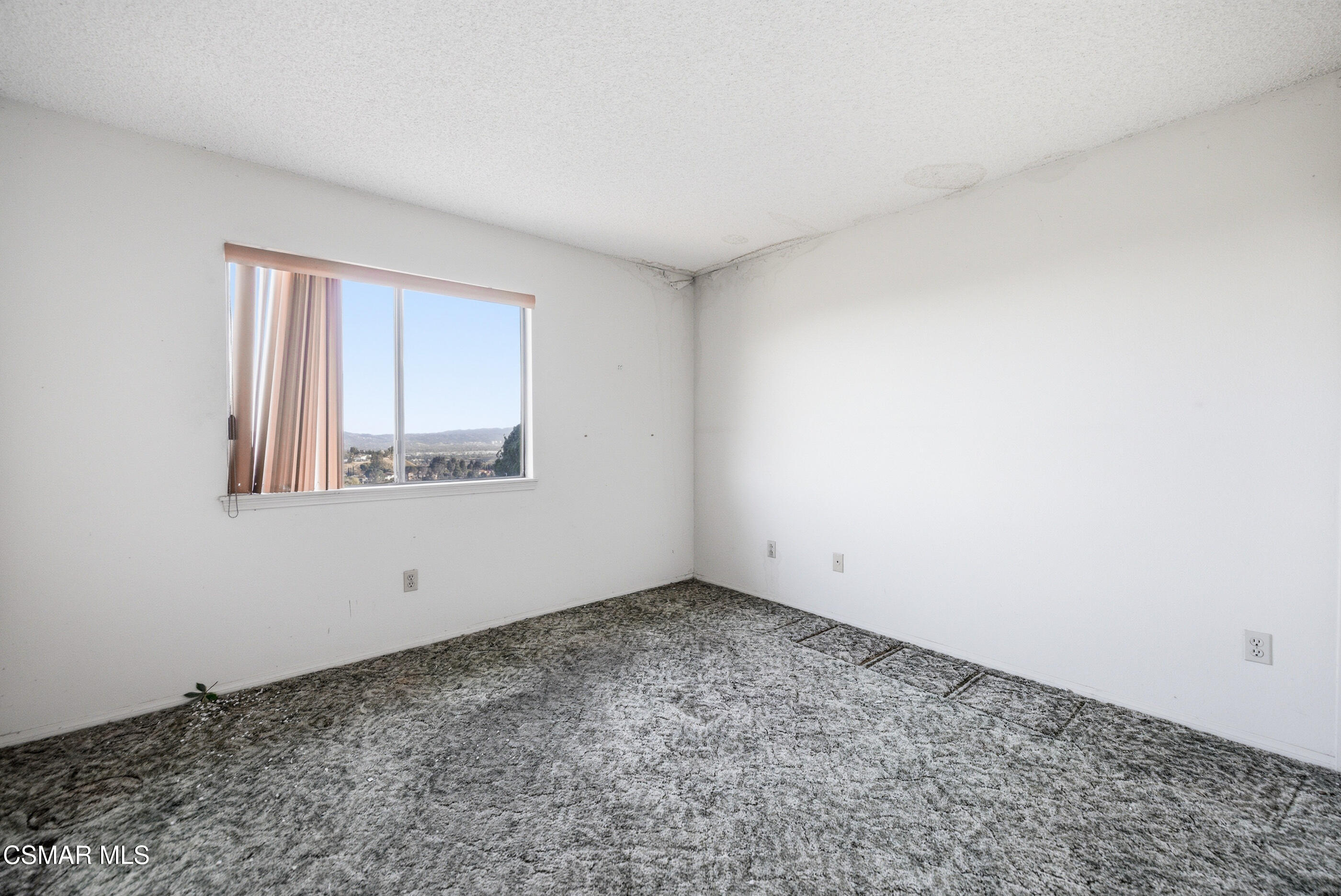 12036 Shadow Ridge Way Porter Ranch, CA 91326 - Photo 27 of 35 a view of an empty room and window