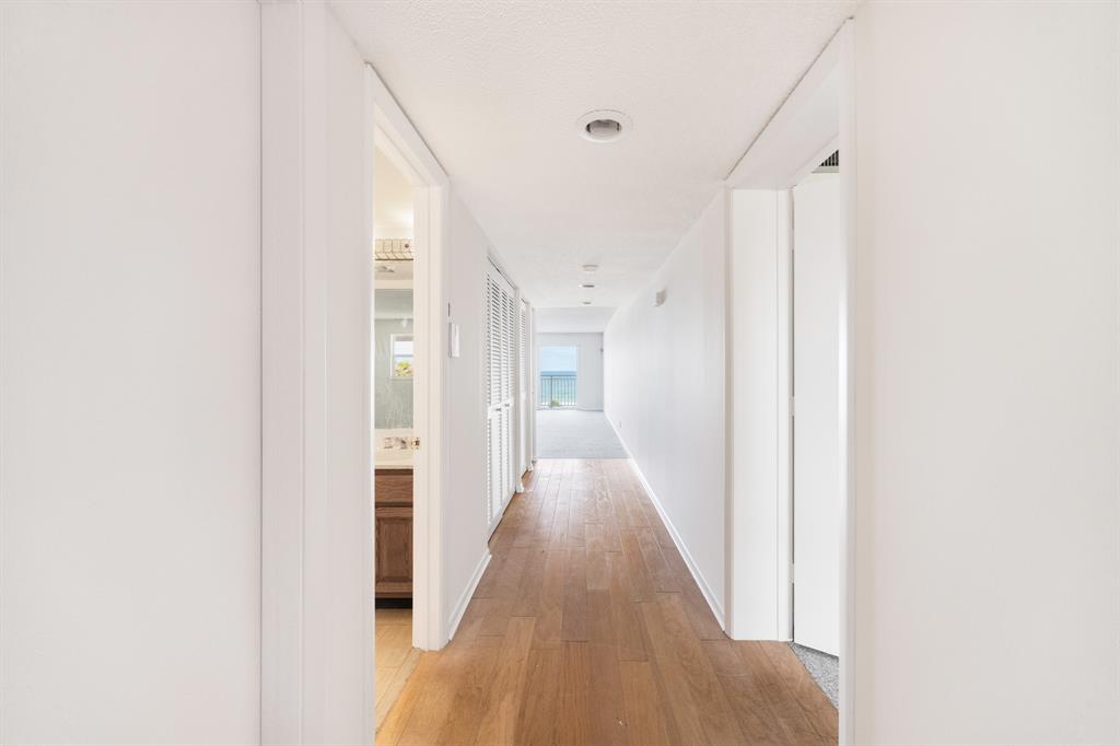 1710 South Ocean Lane, Unit 404 Fort Lauderdale, FL 33316 - Photo 24 of 33 a view of a hallway with wooden floor