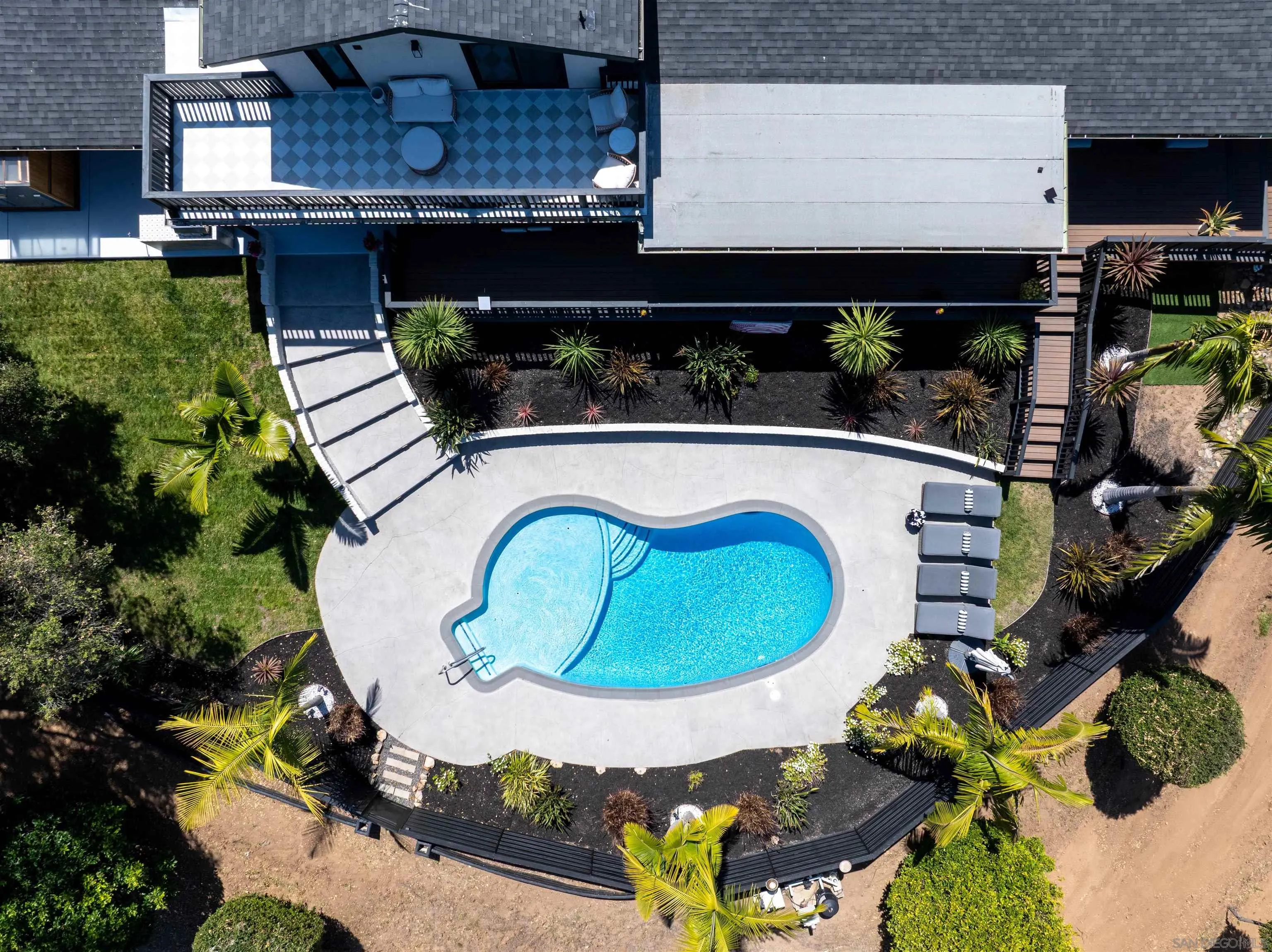 521 Rancho Camino Fallbrook, CA 92028 - Photo 66 of 72 an aerial view of a house with garden space and outdoor seating