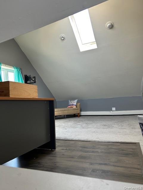 100 Merrick Road Lynbrook, NY 11563 - Photo 9 of 10 a view of room with wooden floor