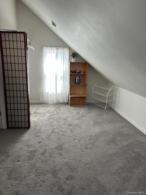 100 Merrick Road Lynbrook, NY 11563 - Photo 10 of 10 an empty room with windows