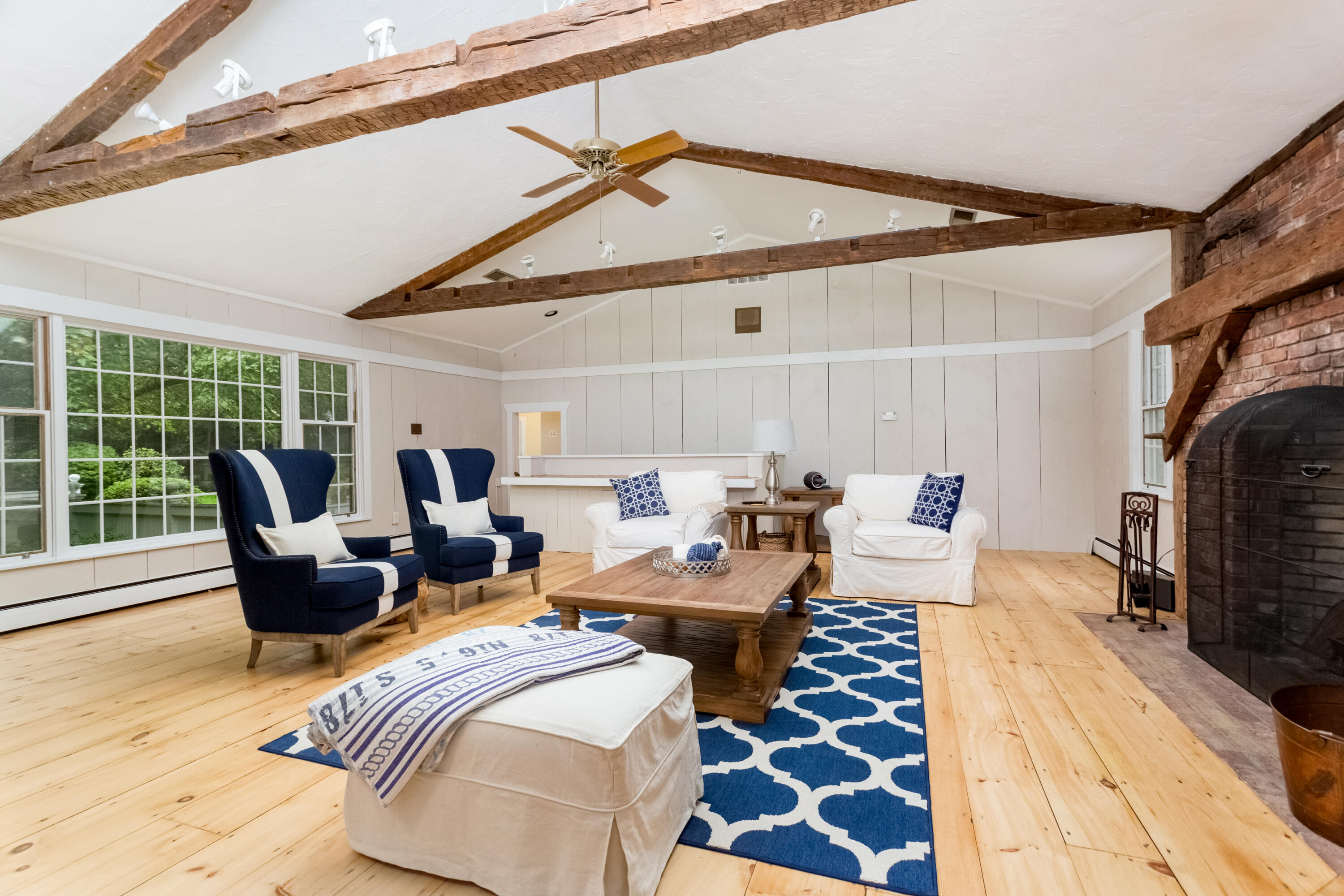 36 Locust Hill Road Darien, CT 06820 - Photo 15 of 40 a bedroom with furniture and a fireplace