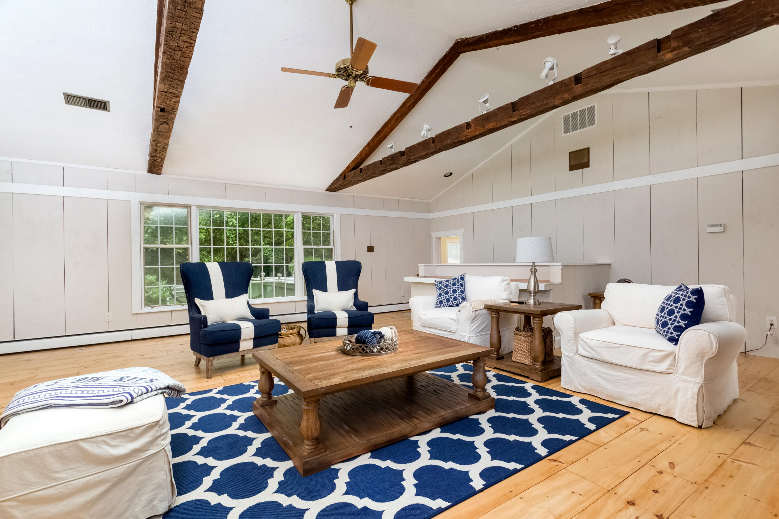36 Locust Hill Road Darien, CT 06820 - Photo 16 of 40 a living room with furniture and a rug