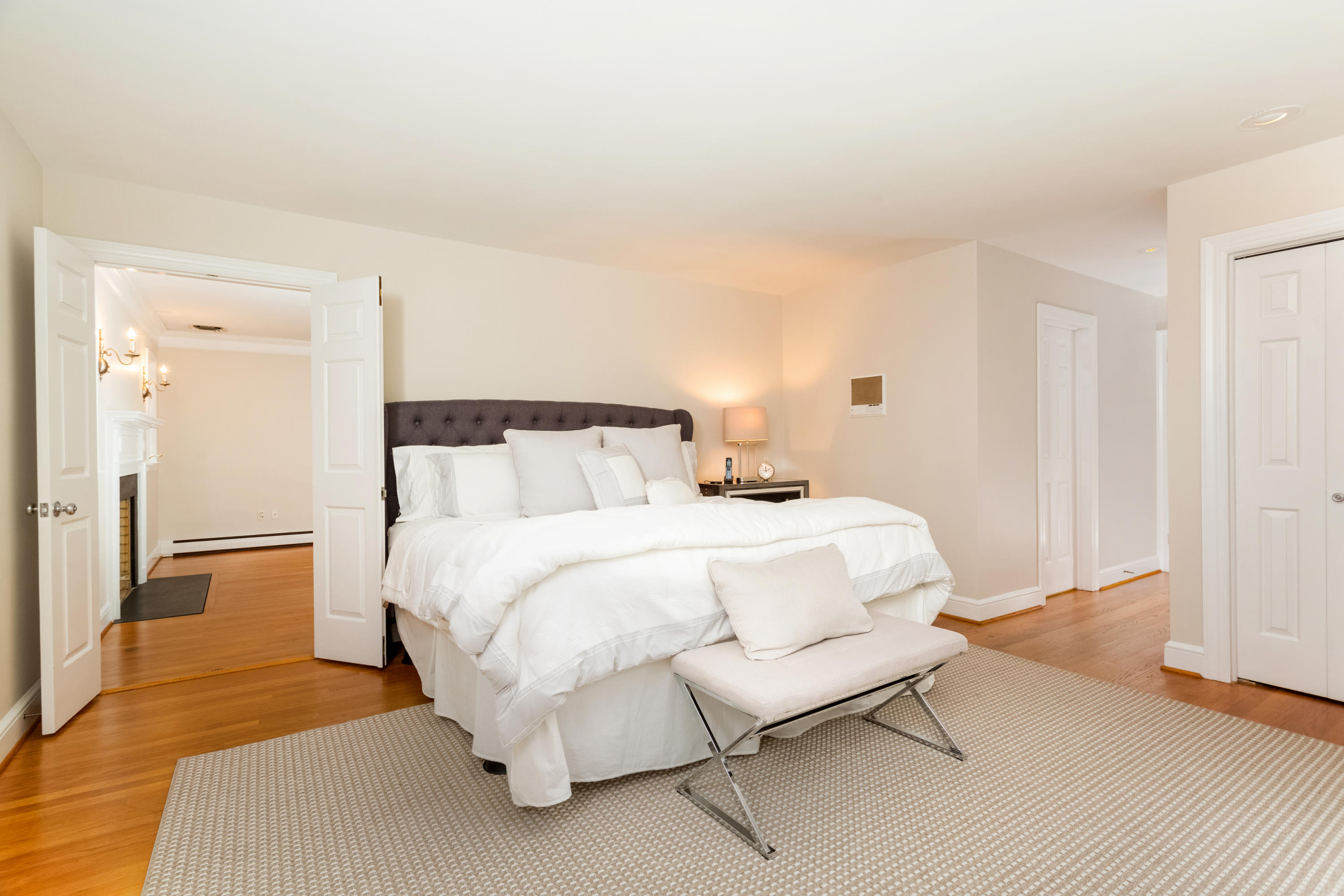 36 Locust Hill Road Darien, CT 06820 - Photo 22 of 40 a bedroom with a bed and wooden floor