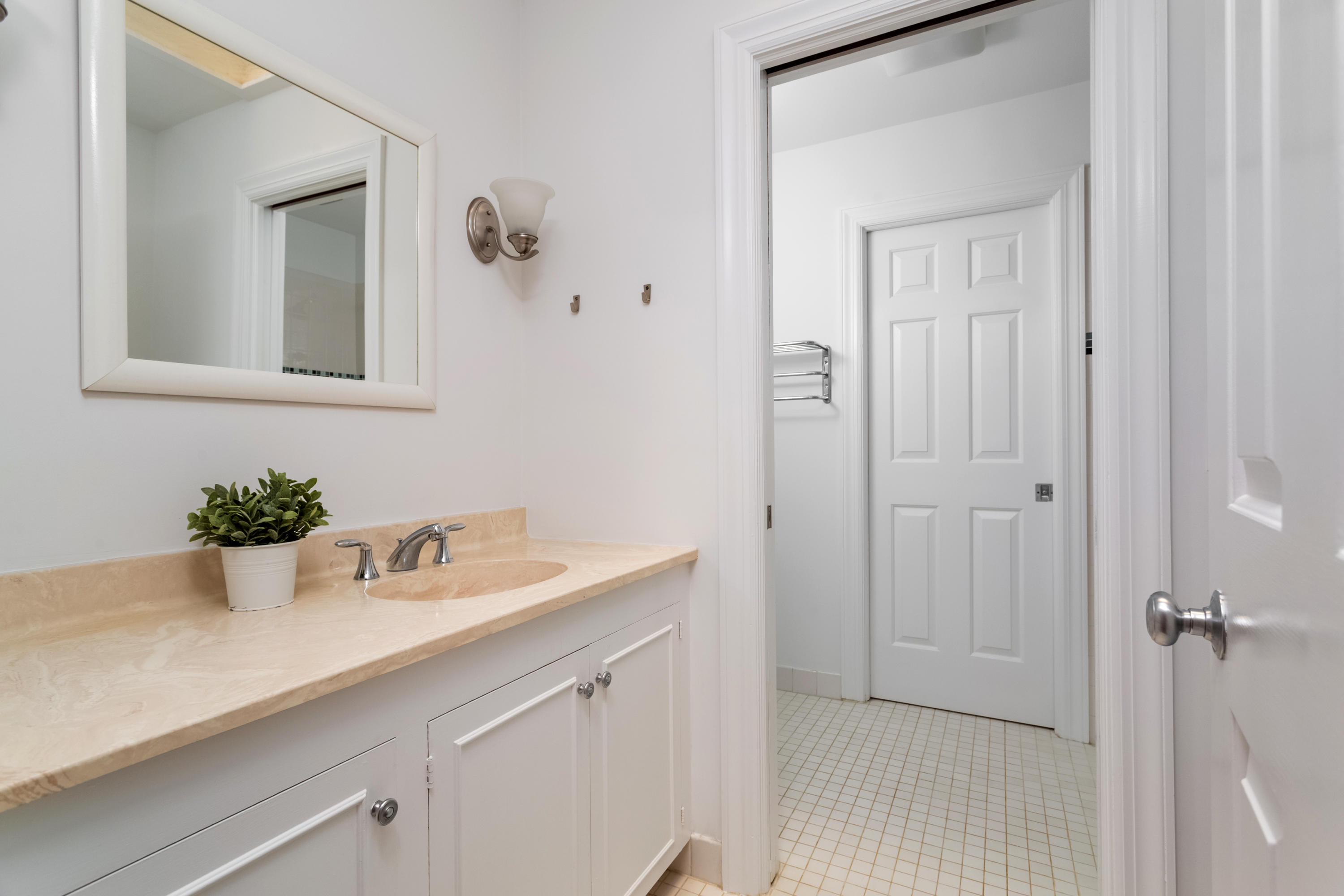 36 Locust Hill Road Darien, CT 06820 - Photo 23 of 40 a bathroom with a sink and mirror