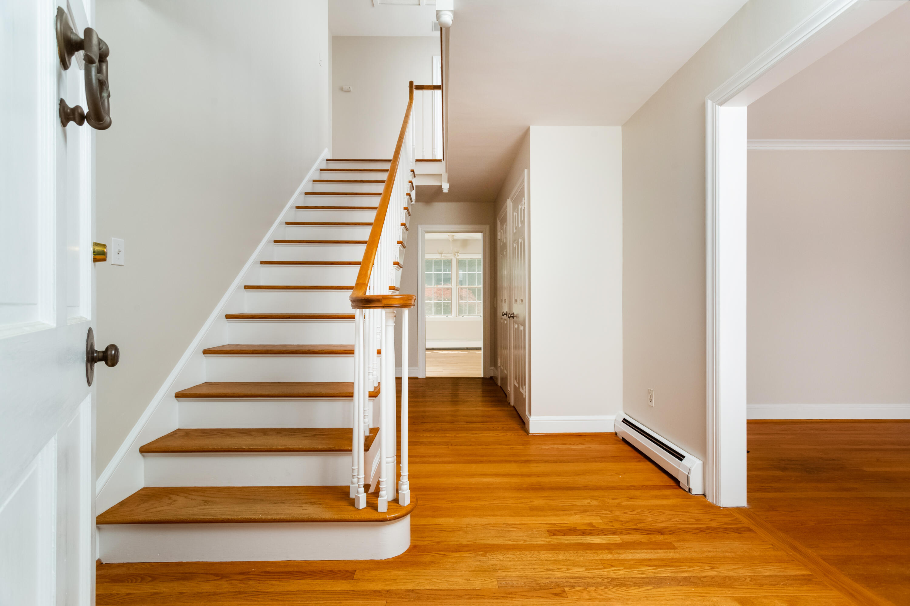 36 Locust Hill Road Darien, CT 06820 - Photo 4 of 40 a view of entryway and hall with wooden floor
