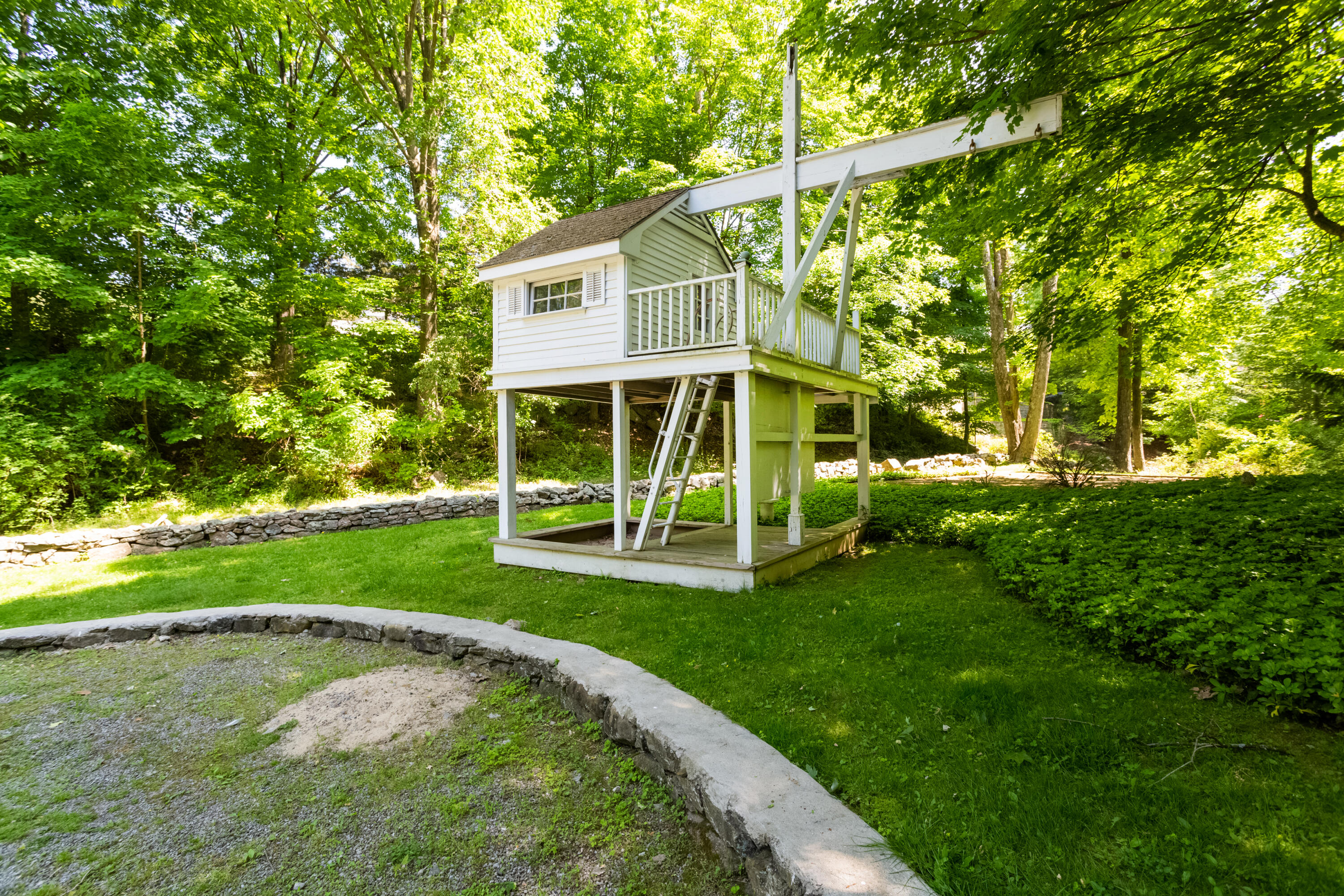 36 Locust Hill Road Darien, CT 06820 - Photo 36 of 40 a view of a house with a yard porch and sitting area