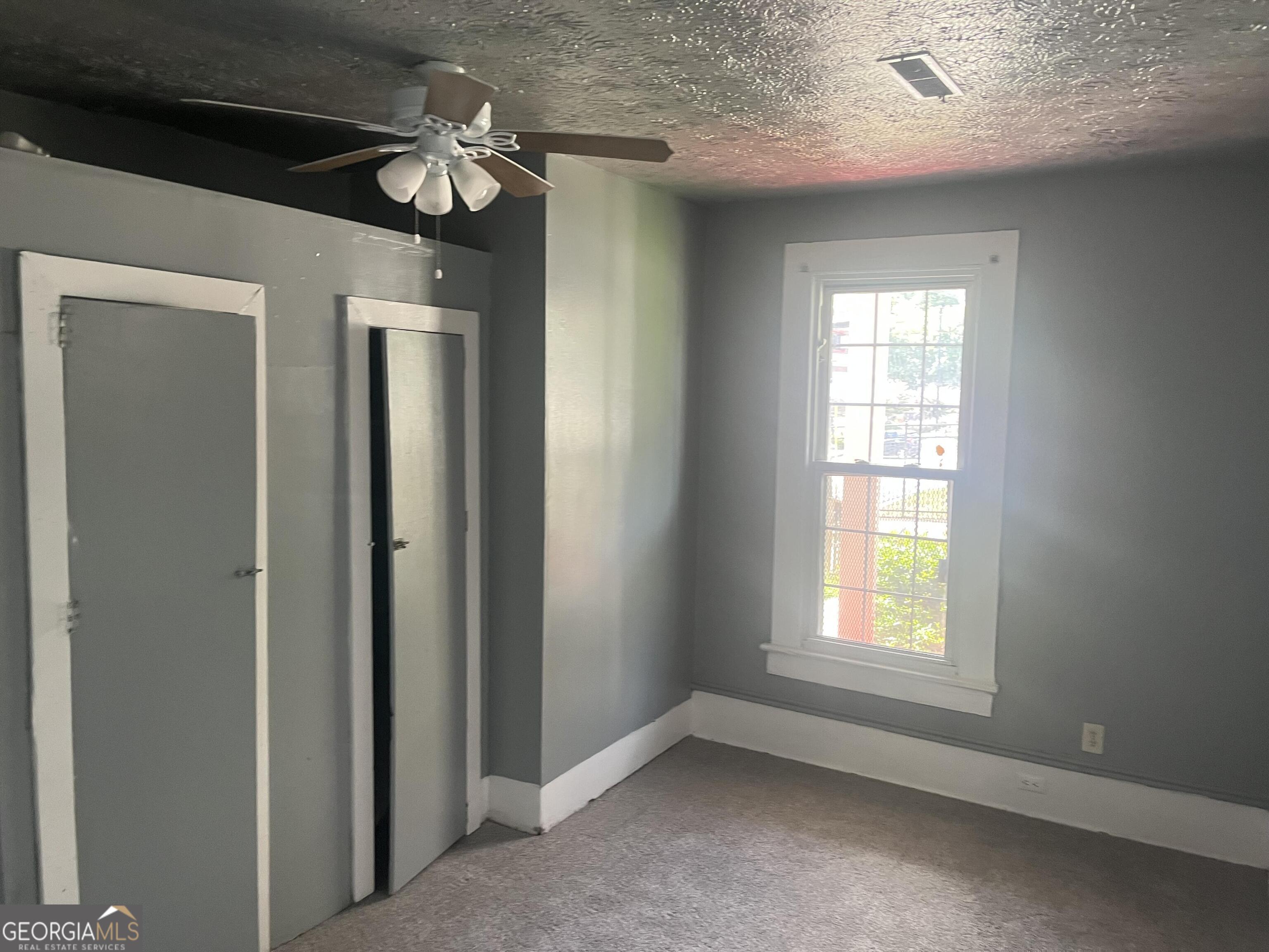 821 Beckwith Street Southwest Atlanta, GA 30314 - Photo 13 of 16 a view of an empty room with a window