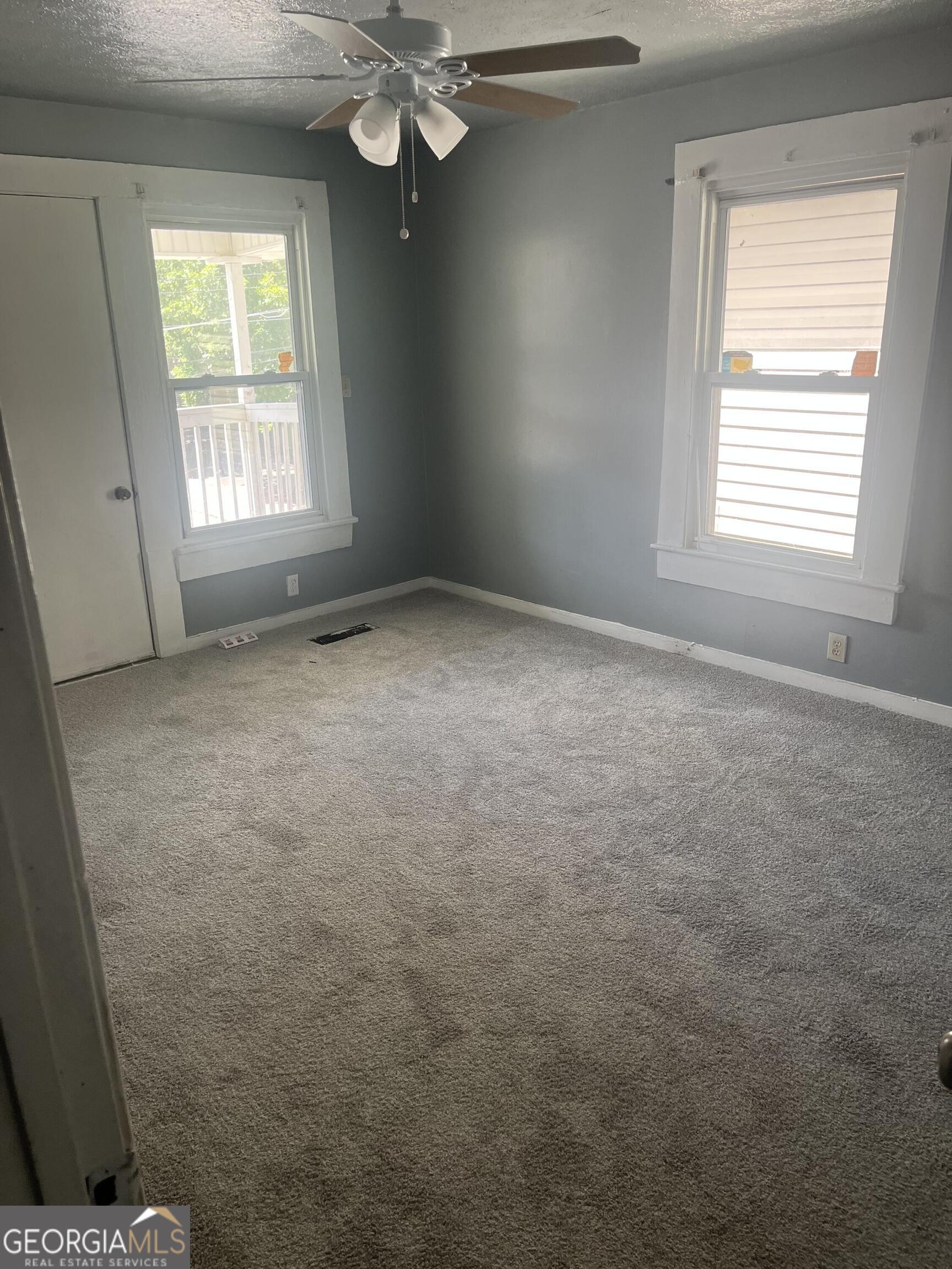 821 Beckwith Street Southwest Atlanta, GA 30314 - Photo 14 of 16 a view of an empty room with a window