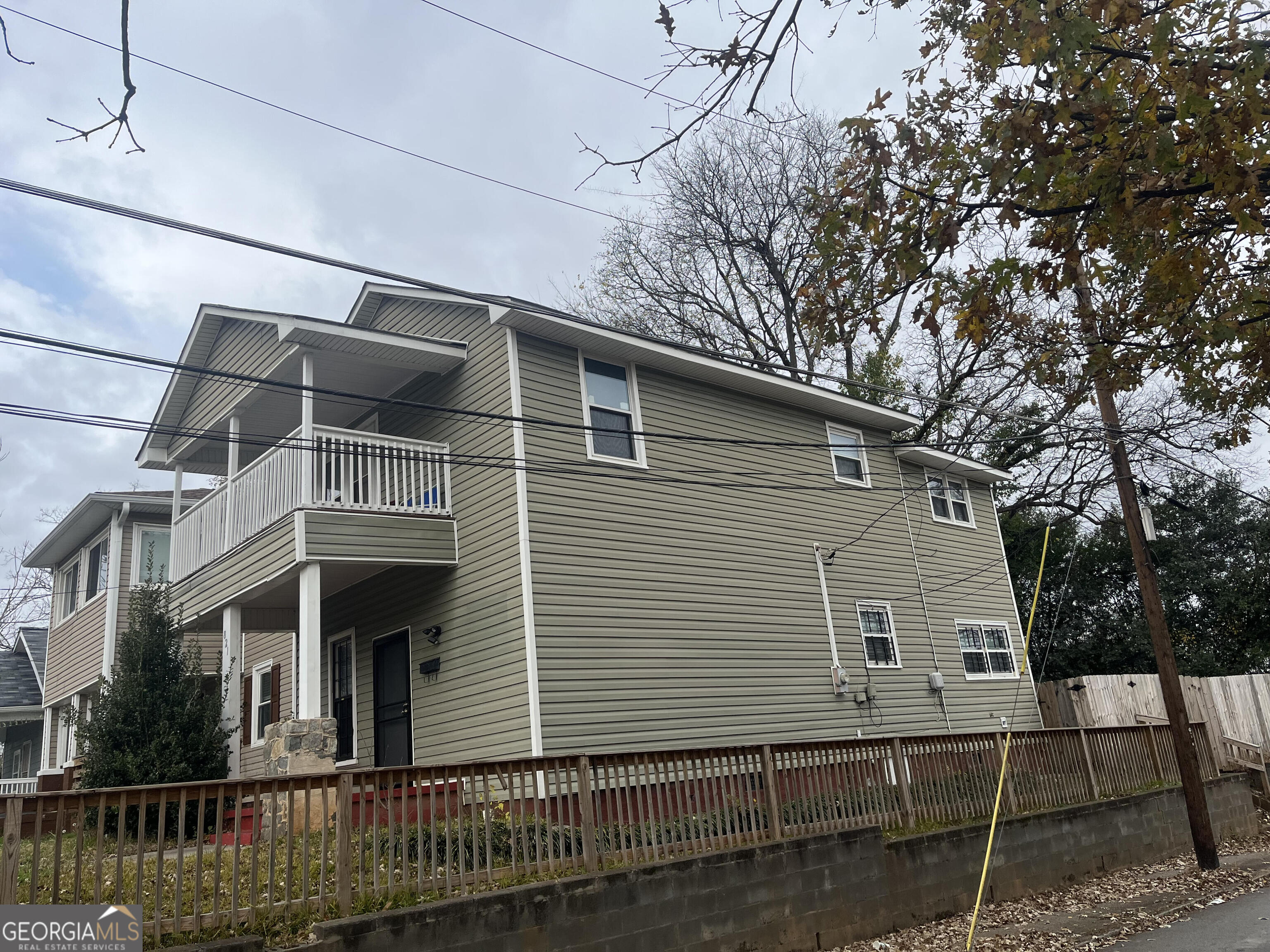 821 Beckwith Street Southwest Atlanta, GA 30314 - Photo 2 of 16 a view of house with a yard and seating area