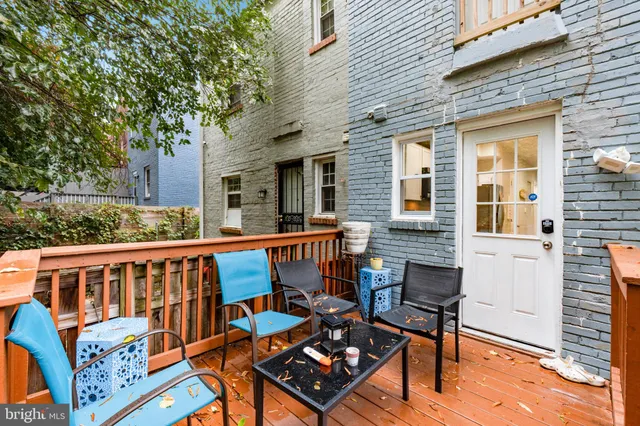 a kitchen with stainless steel appliances a refrigerator sink and microwave