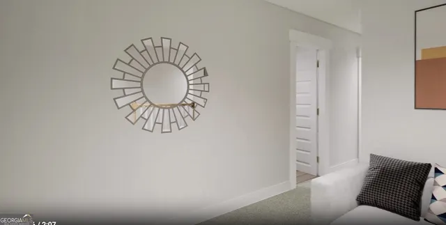 a view of a hallway with a couch