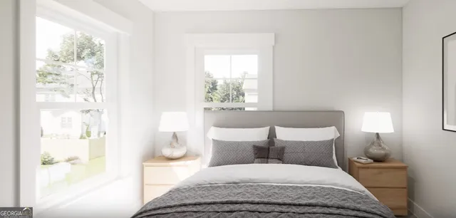 a bedroom with a bed and a large window