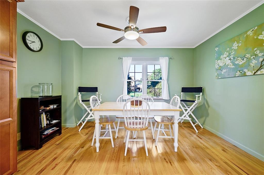 2016 Ridge Rd Extension Ambridge, PA 15003 - Photo 12 of 25 a view of a dining room with furniture window and wooden floor