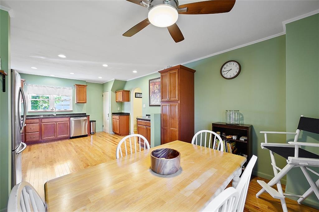 2016 Ridge Rd Extension Ambridge, PA 15003 - Photo 13 of 25 a kitchen with a table and chairs