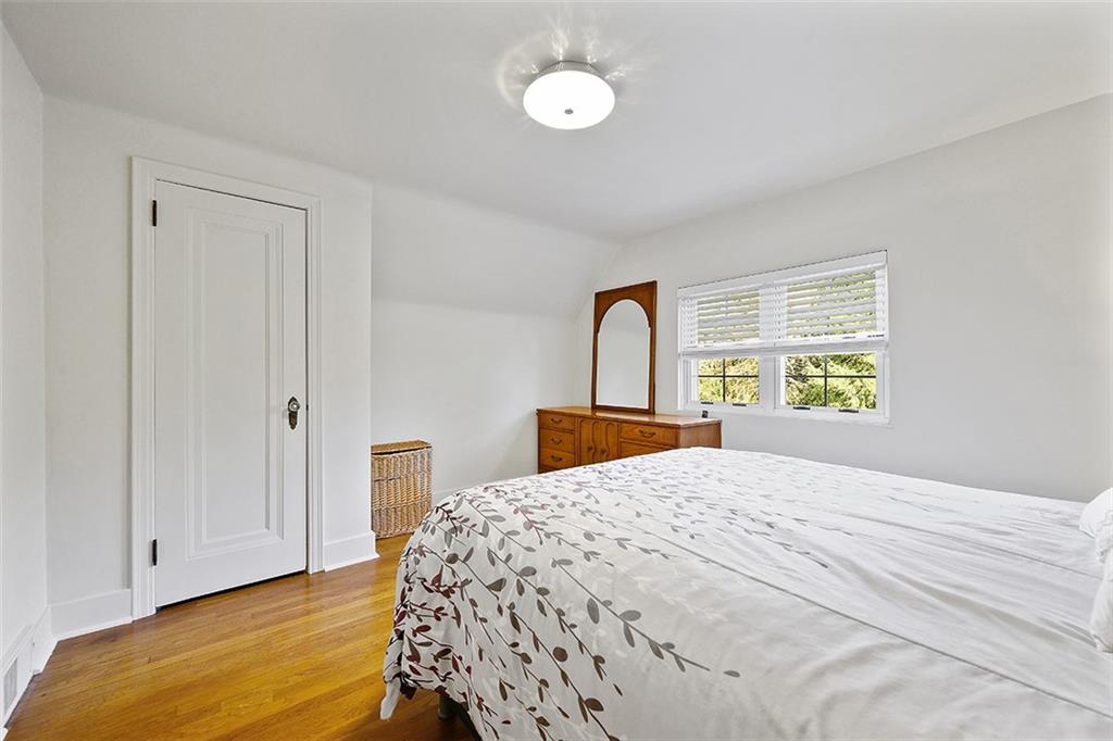 2016 Ridge Rd Extension Ambridge, PA 15003 - Photo 17 of 25 a bedroom with a bed and a window