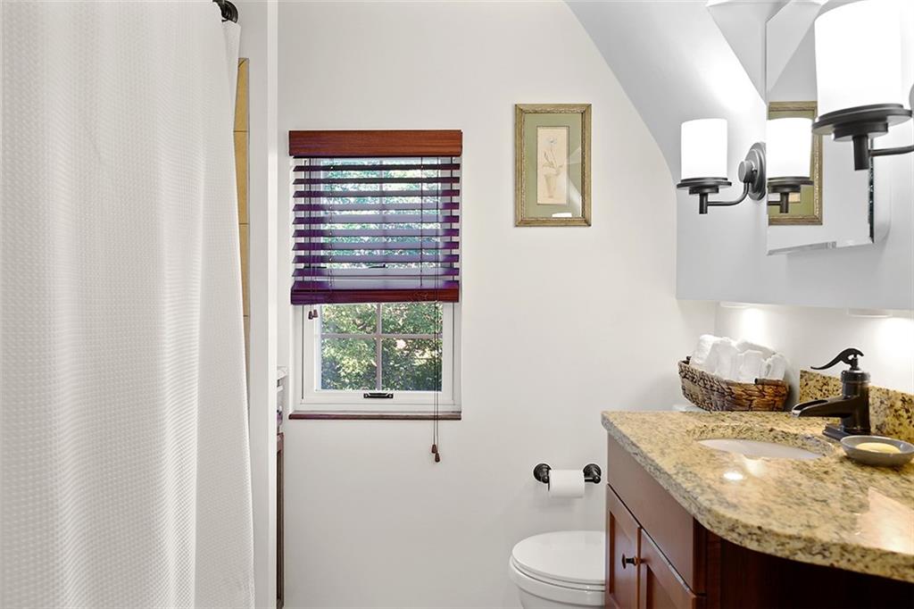 2016 Ridge Rd Extension Ambridge, PA 15003 - Photo 19 of 25 a bathroom with a granite countertop sink toilet and mirror
