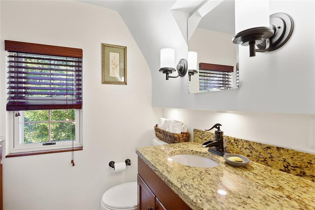 2016 Ridge Rd Extension Ambridge, PA 15003 - Photo 21 of 25 a bathroom with a granite countertop sink and a mirror