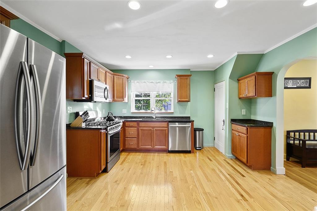 2016 Ridge Rd Extension Ambridge, PA 15003 - Photo 10 of 25 a kitchen with stainless steel appliances granite countertop a refrigerator a stove top oven a sink and dishwasher