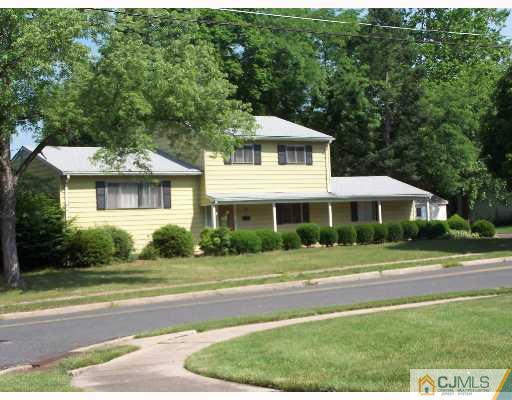 26 Lexington Road Somerset, NJ 08873 - Photo 1 of 10 a front view of a house with a yard