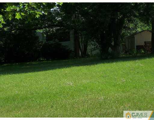 26 Lexington Road Somerset, NJ 08873 - Photo 3 of 10 a view of an outdoor space and a yard