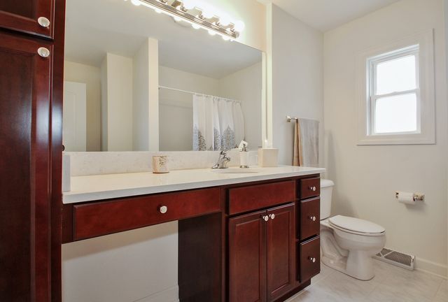 a bathroom with a sink and a toilet