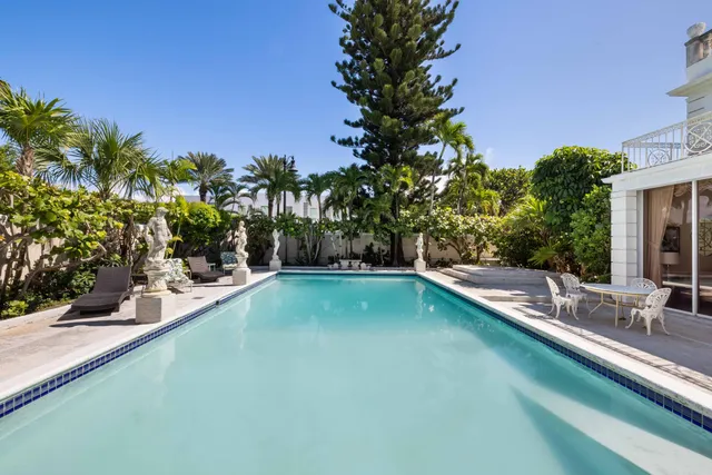a view of a house with swimming pool