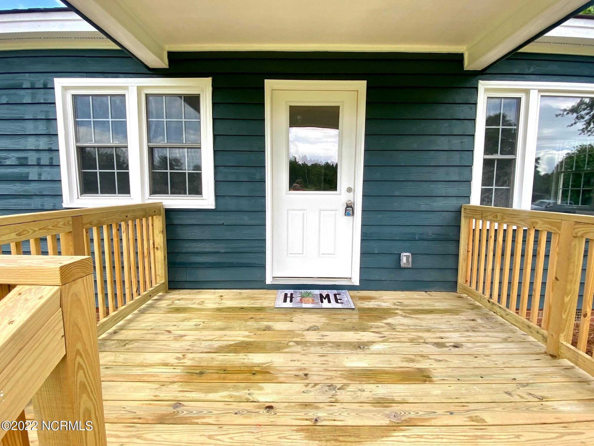 493 Jam Road Tabor City, NC 28463 - Photo 4 of 48 With Covered Porch
