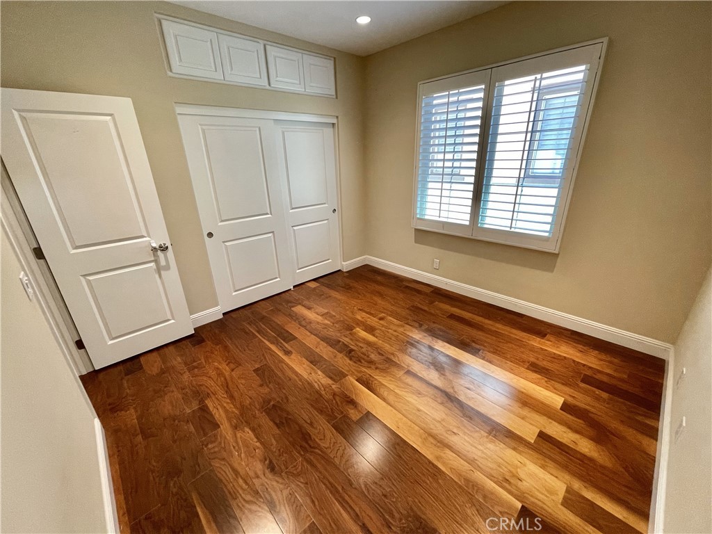 56 Scented Violet Irvine, CA 92620 - Photo 8 of 8 a view of an empty room with a window