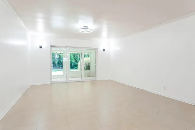 an empty room with window