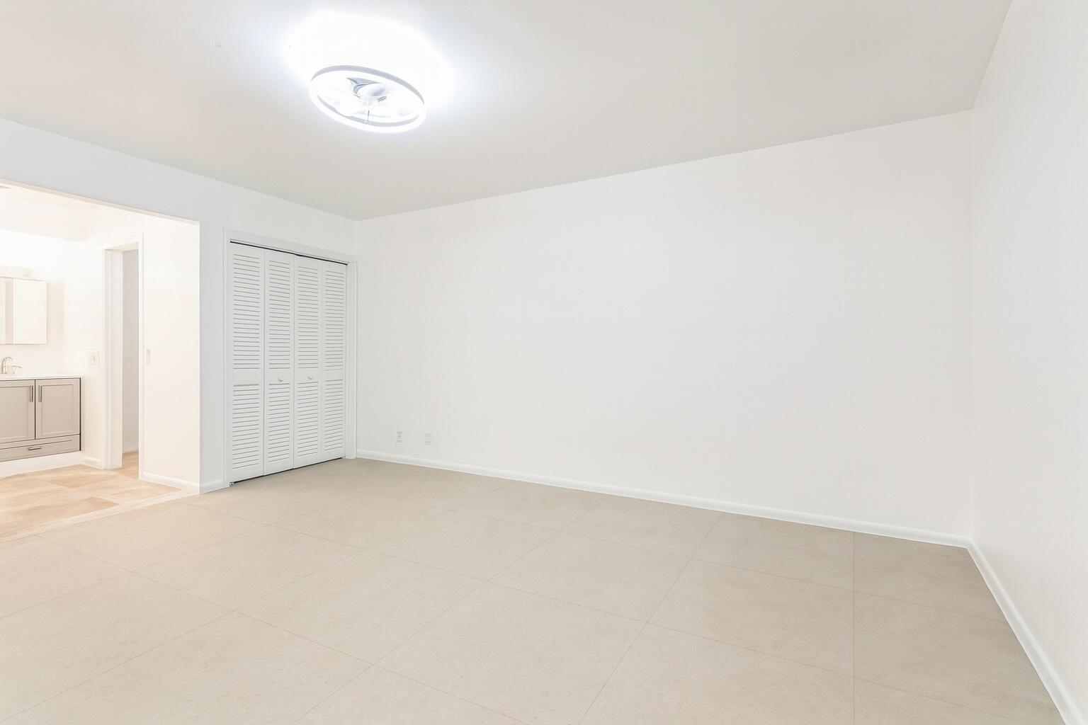 1217 Surf Road, Unit 2 Singer Island, FL 33404 - Photo 10 of 18 a view of an empty room