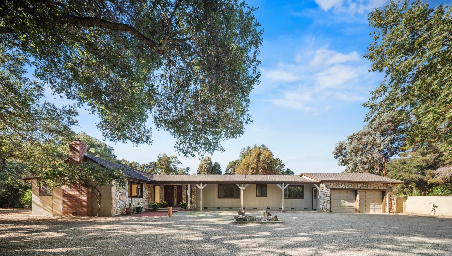 59 Boronda Road Carmel Valley, CA 93924 - Photo 1 of 43 front view of a house with a big yard