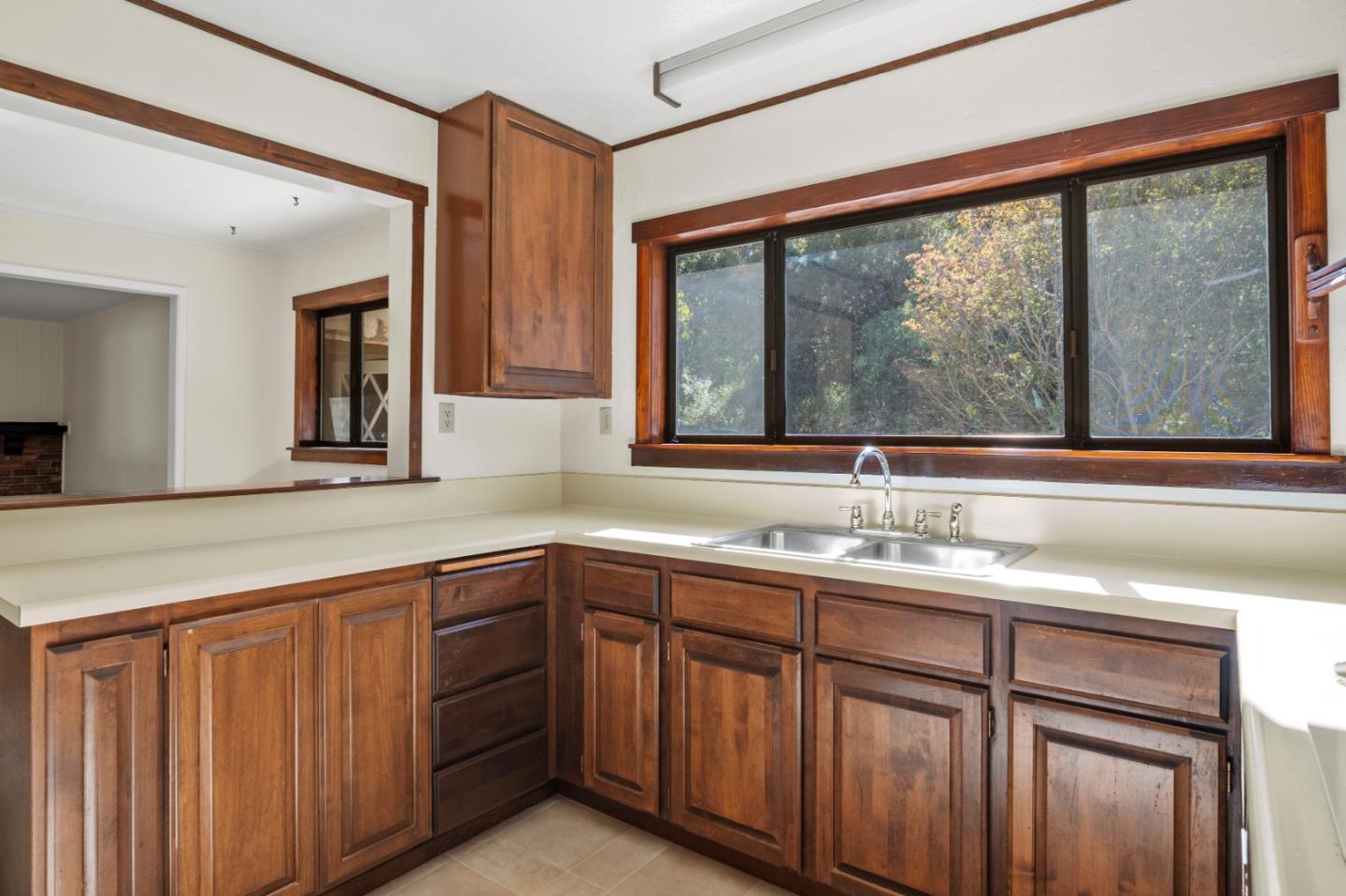 59 Boronda Road Carmel Valley, CA 93924 - Photo 15 of 43 a bathroom with a granite countertop sink and a large mirror