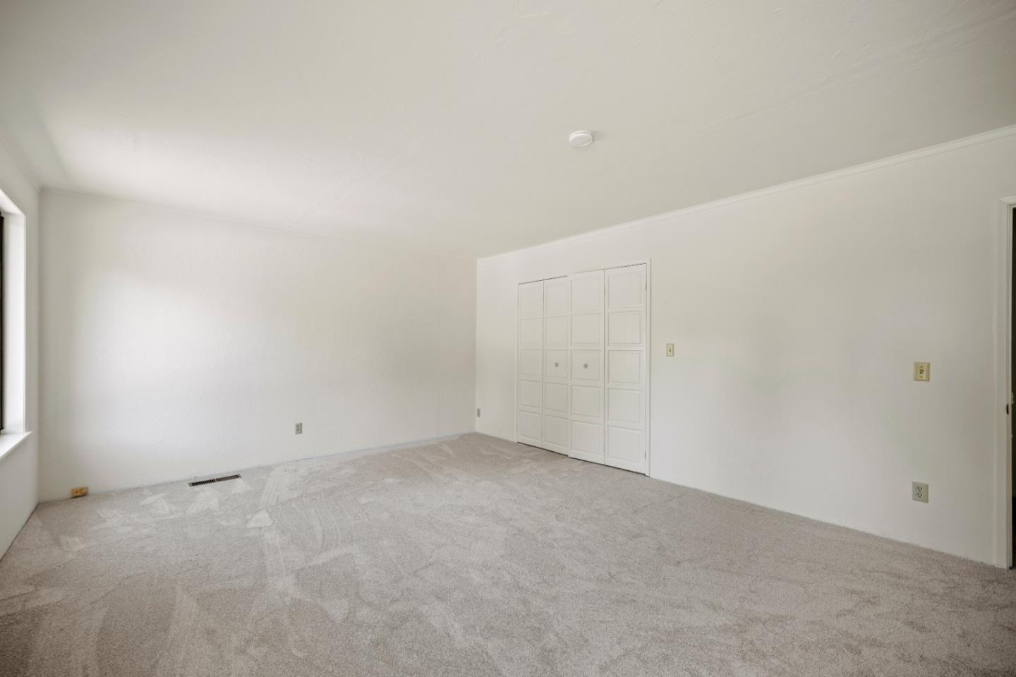 59 Boronda Road Carmel Valley, CA 93924 - Photo 21 of 43 an empty room with an entryway