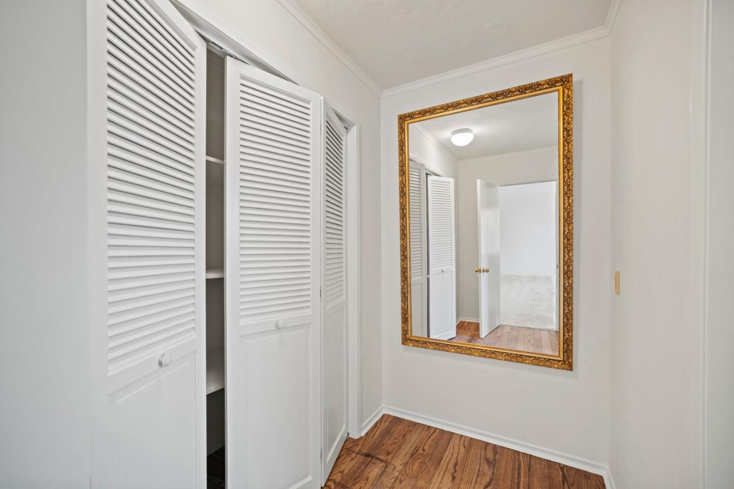 59 Boronda Road Carmel Valley, CA 93924 - Photo 22 of 43 a view of a bedroom from a hallway