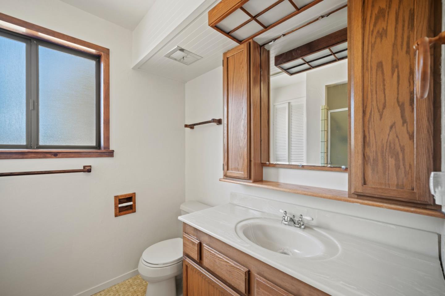 59 Boronda Road Carmel Valley, CA 93924 - Photo 23 of 43 a bathroom with a sink toilet and shower