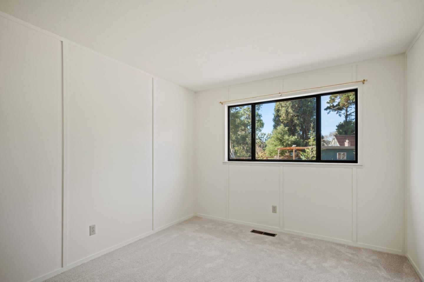 59 Boronda Road Carmel Valley, CA 93924 - Photo 24 of 43 a view of an empty room with a window