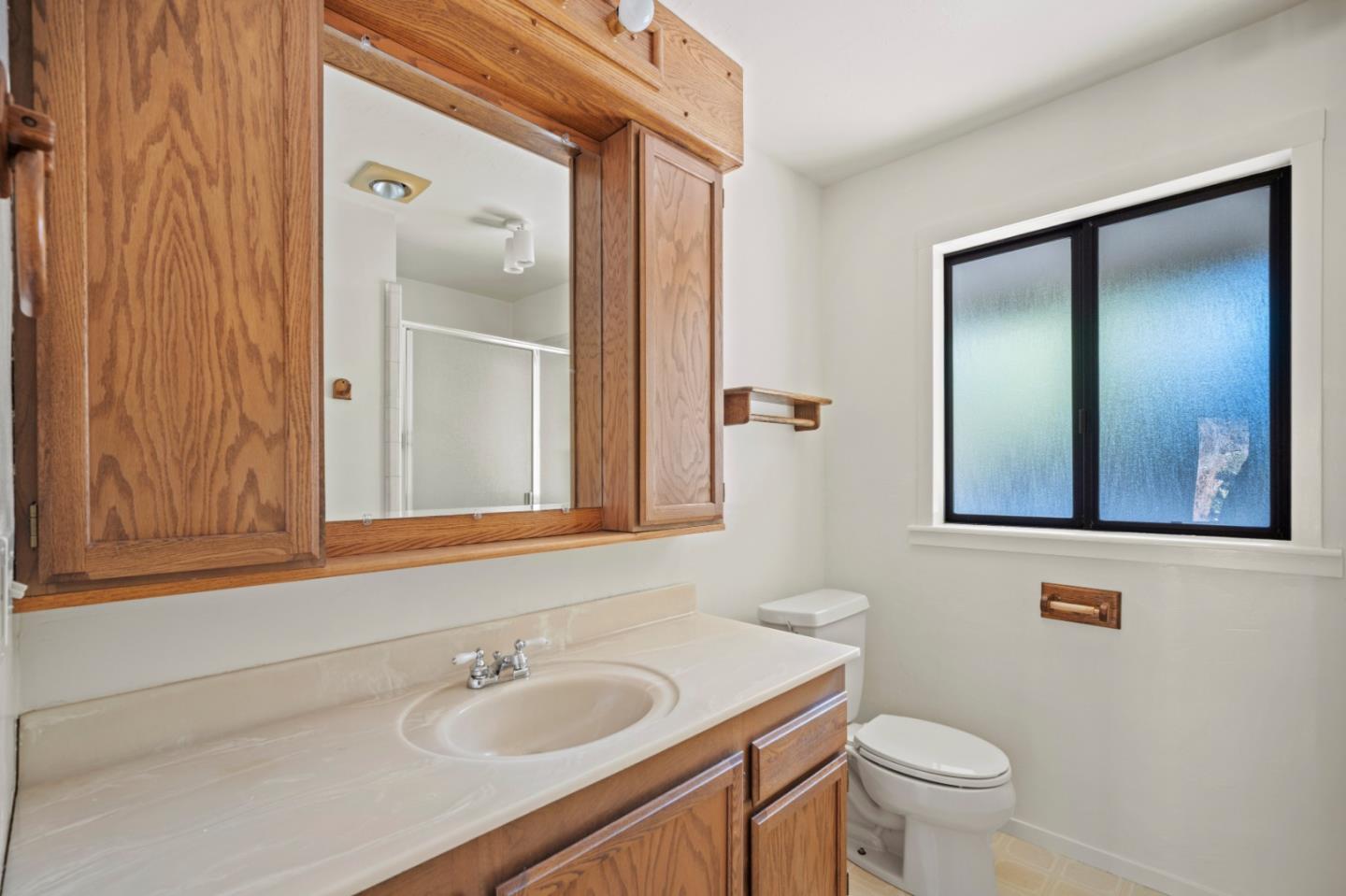 59 Boronda Road Carmel Valley, CA 93924 - Photo 28 of 43 a bathroom with a sink and a mirror