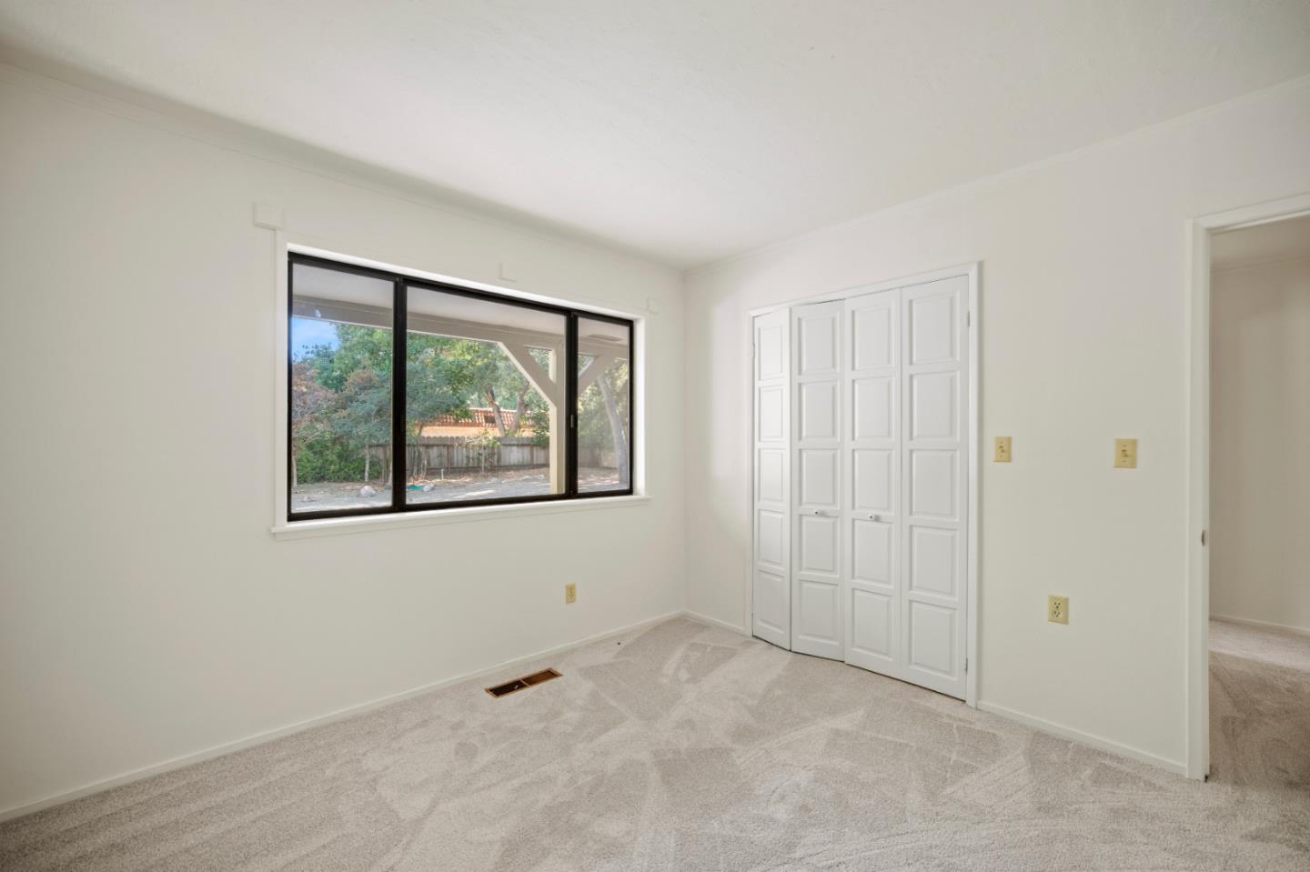 59 Boronda Road Carmel Valley, CA 93924 - Photo 31 of 43 a view of an empty room with a window