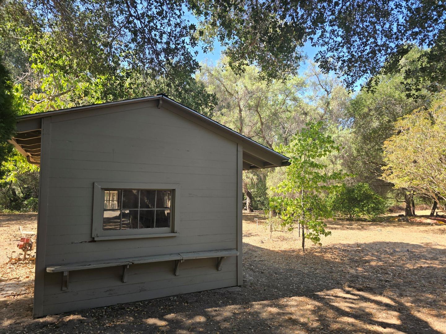 59 Boronda Road Carmel Valley, CA 93924 - Photo 32 of 43 a front view of a house with a yard