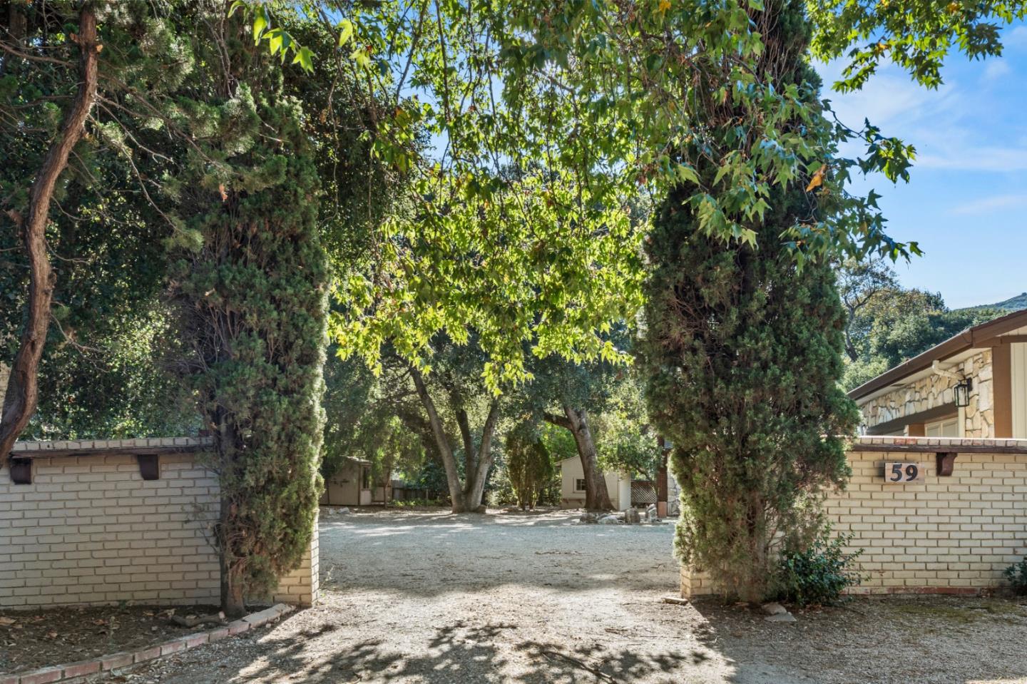 59 Boronda Road Carmel Valley, CA 93924 - Photo 39 of 43 a view of a yard with plants and trees