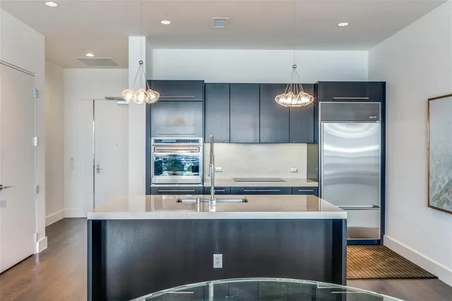 a view of kitchen with cabinets and wooden floor