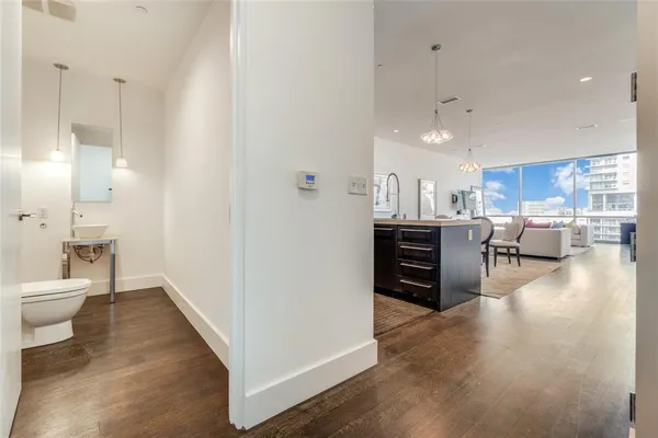 a view of kitchen with furniture and wooden floor