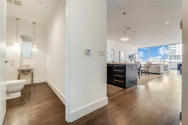 a view of kitchen with furniture and wooden floor