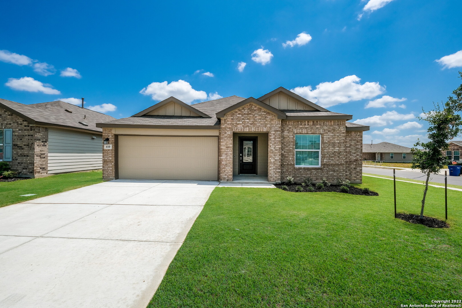 5976 American Elm Bulverde, TX 78163 - Photo 1 of 1 a front view of a house with garden