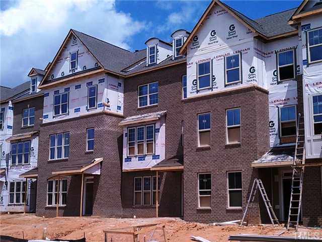 1319 Rodessa Raleigh, NC 27607 - Photo 1 of 1 a front view of a building with street