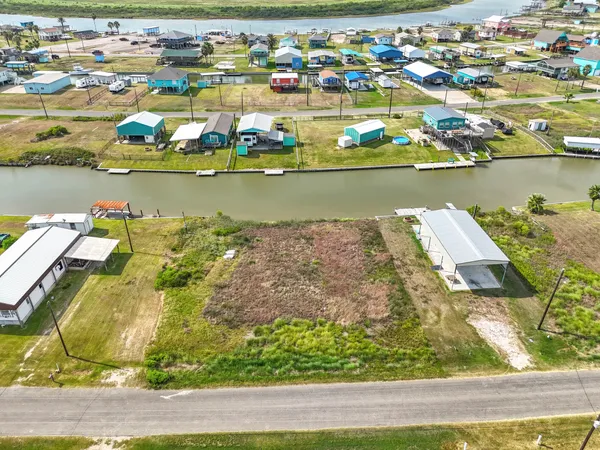 an aerial view of a houses with outdoor space