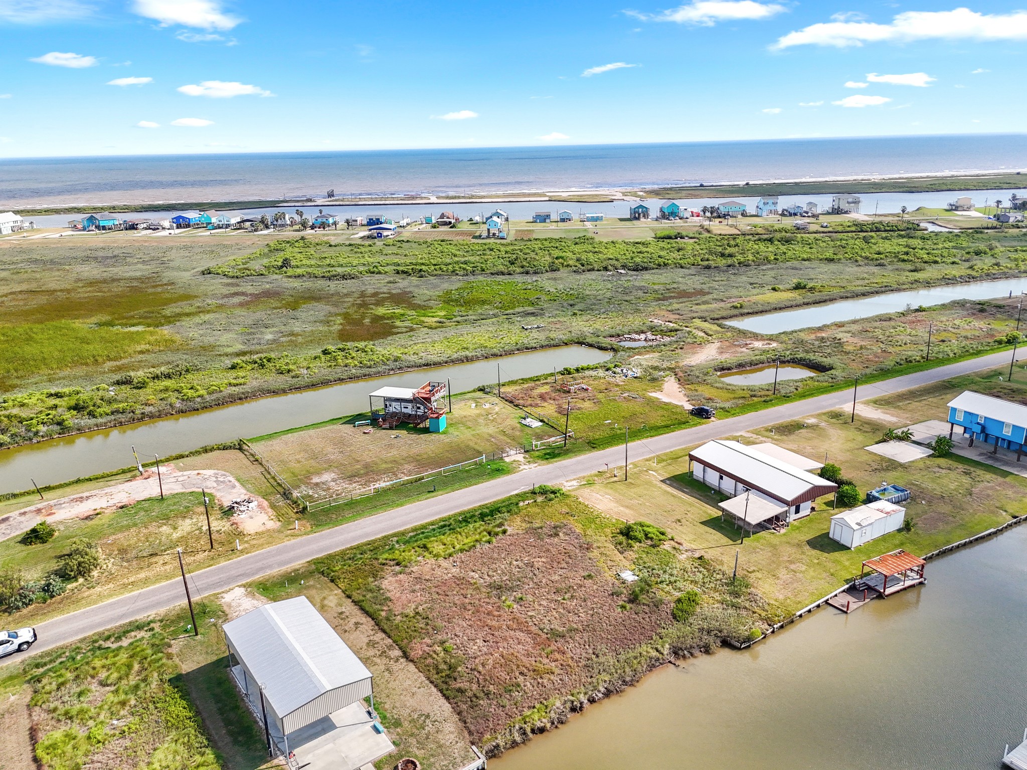 204 Dolphin Way Road Sargent, TX 77414 - Photo 11 of 11 a view of an ocean and a mountain