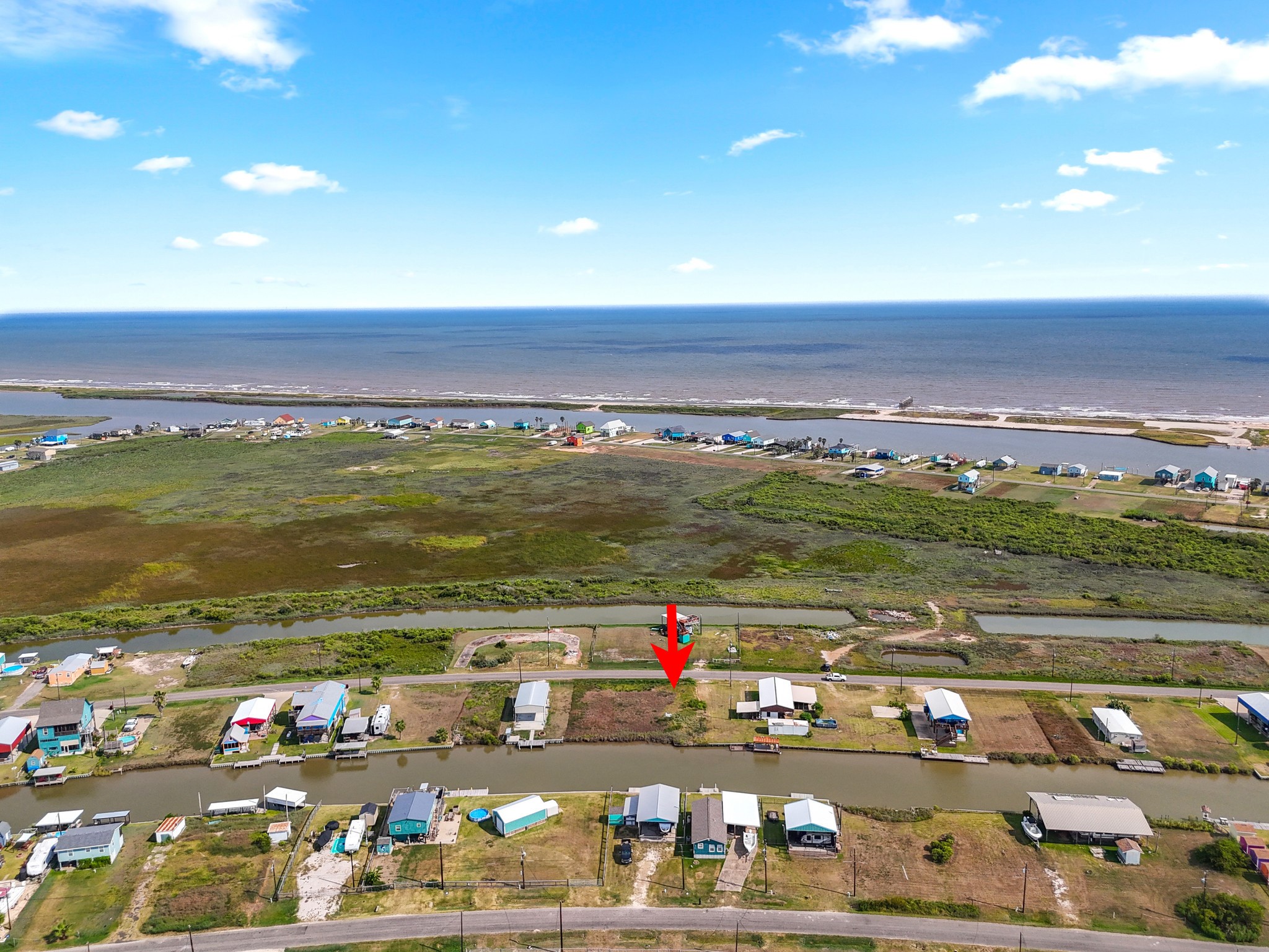 204 Dolphin Way Road Sargent, TX 77414 - Photo 2 of 11 a view of city and ocean